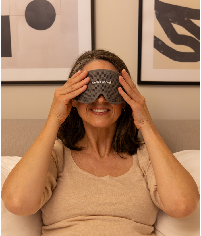 Woman putting on the Dream mask