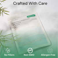 Packaging of magnesium supplement with bamboo leaves on a light background