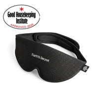 Black sleep mask with 'Earth's Secret' branding and Good Housekeeping Institute approval logo on a white background.