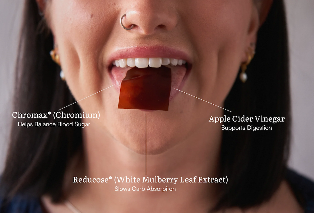 Women mouth open with regulate on tongue