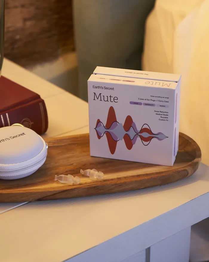 Mute box and carry case on a bedside table